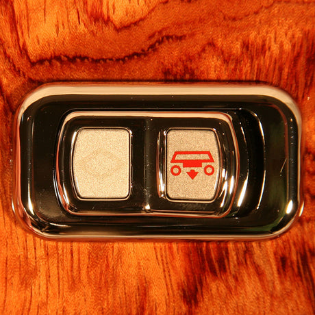 Detail of chrome rocker switch actuator buttons with LED for Peterbilt, close-up
