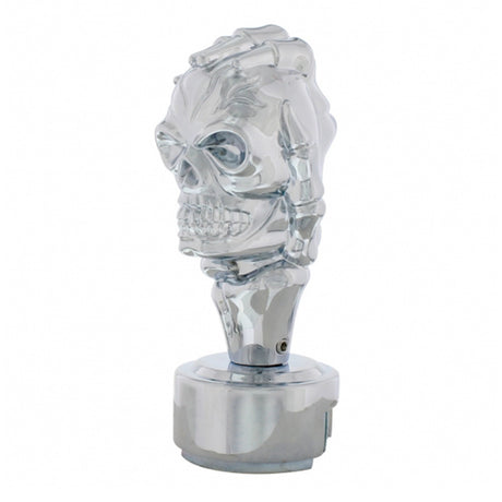 Close-up of chrome thread-on skull in hand gearshift knob