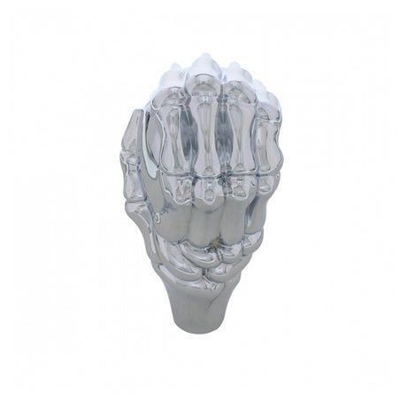 Chrome skull and hand gearshift knob, close-up