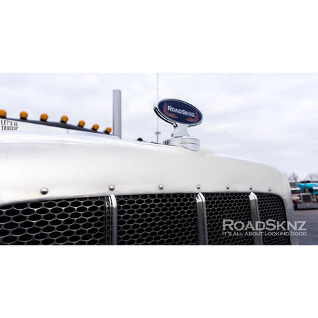 Peterbilt 389 oval hood ornament with hood pull base, close-up