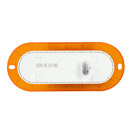Amber oval side marker and turn LED light, close-up