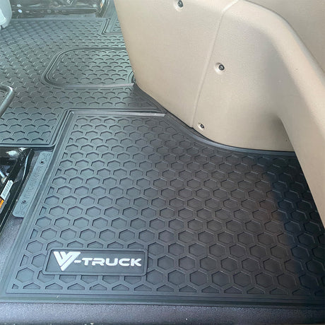 Close-up of Freightliner Cascadia floor mats 113 and 125