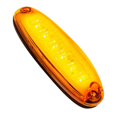 Close-up of Freightliner Cascadia amber/amber LED cab light