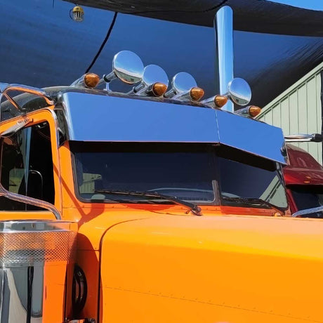1987-2024 Peterbilt ultra cab stainless 11" x 8" bow-tie visor with blind mount, close-up